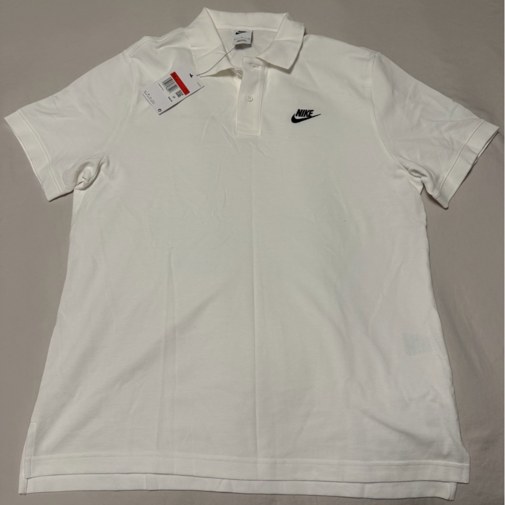 Nike Men’s White Polo with Black Swoosh